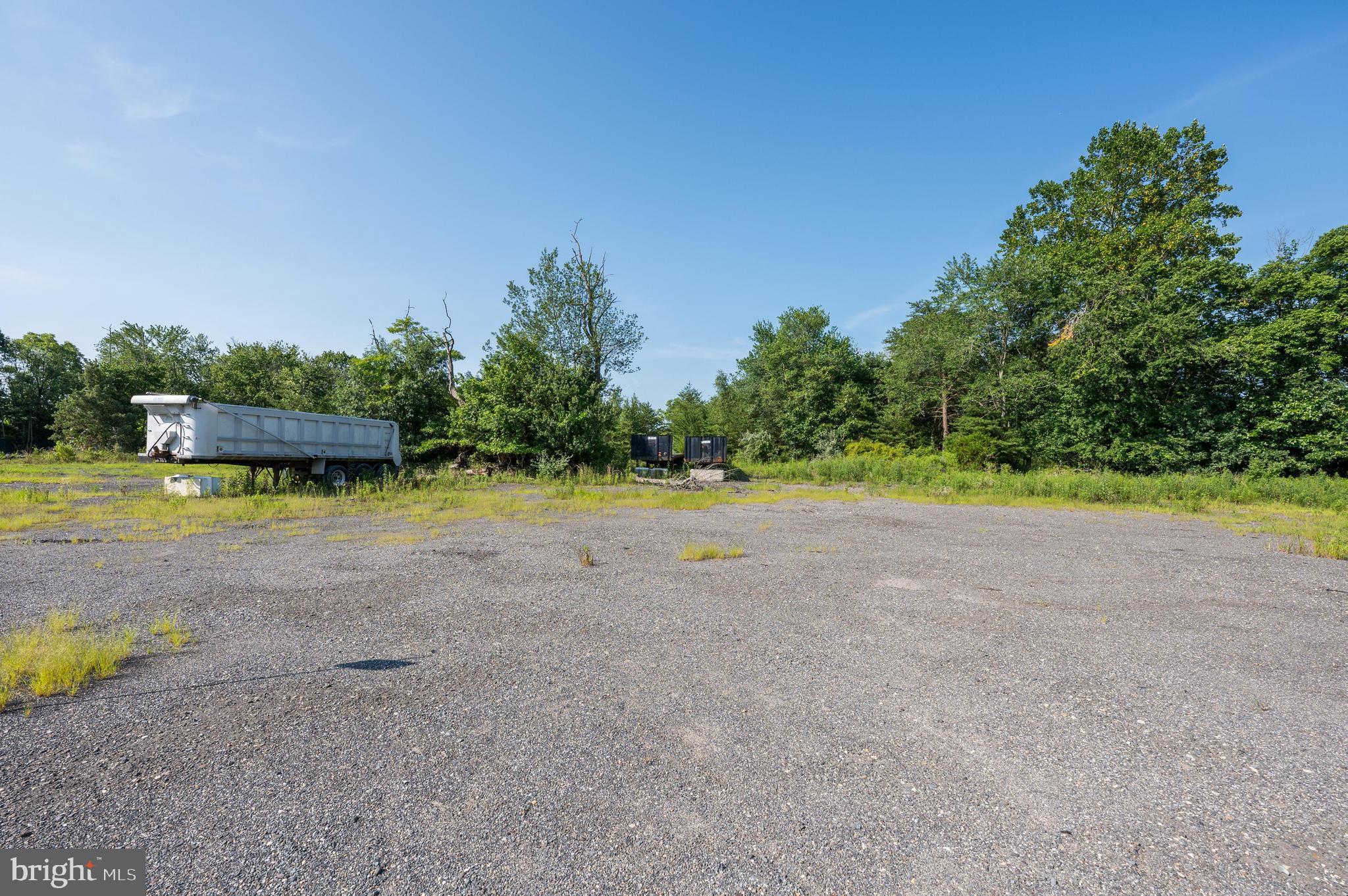 773 Watsontown Road Berlin, NJ 08009 - Photo 17 of 20 a view of a swimming pool with an outdoor space and seating area