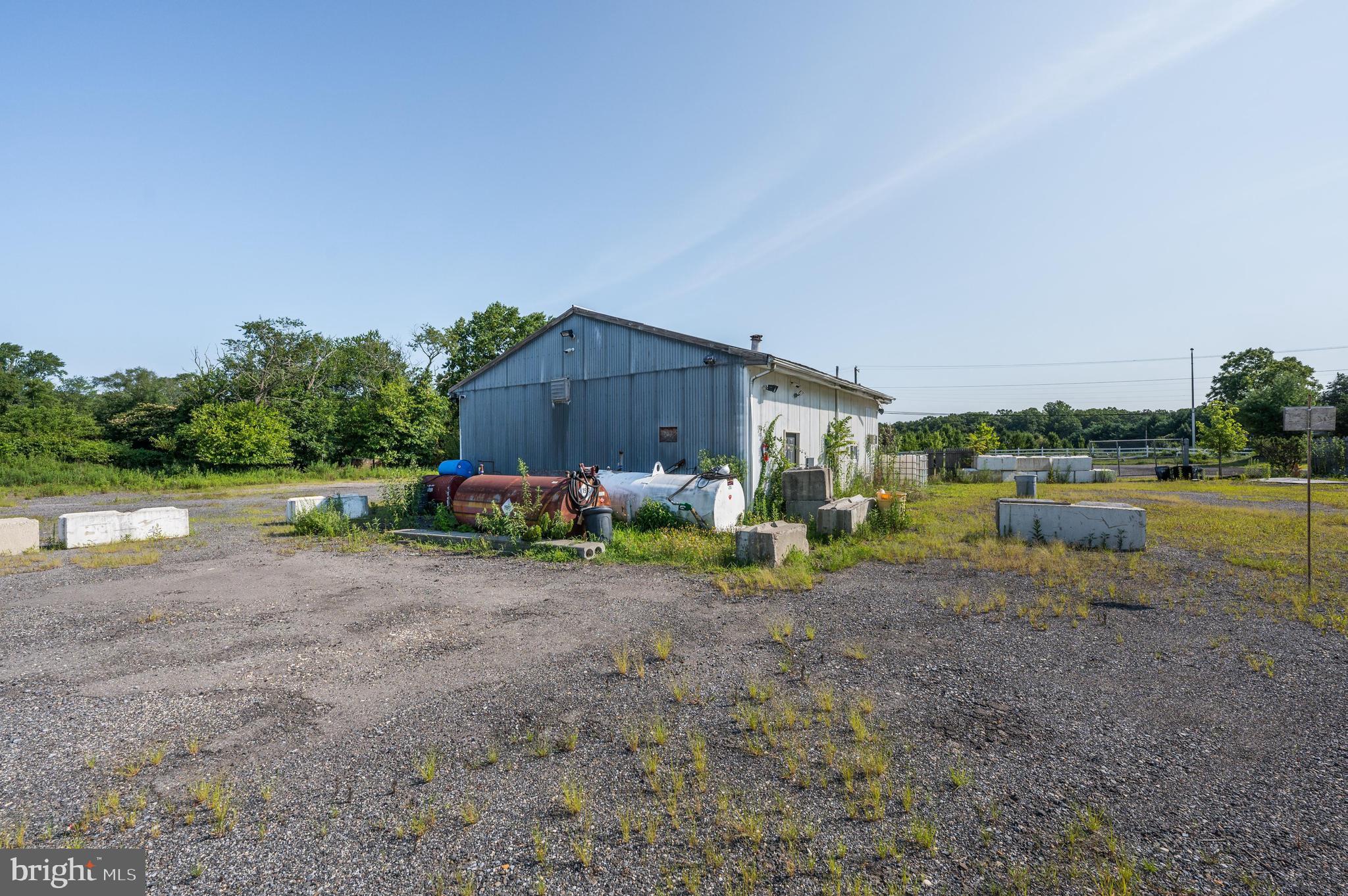 773 Watsontown Road Berlin, NJ 08009 - Photo 19 of 20 a view of a house with a yard and a table
