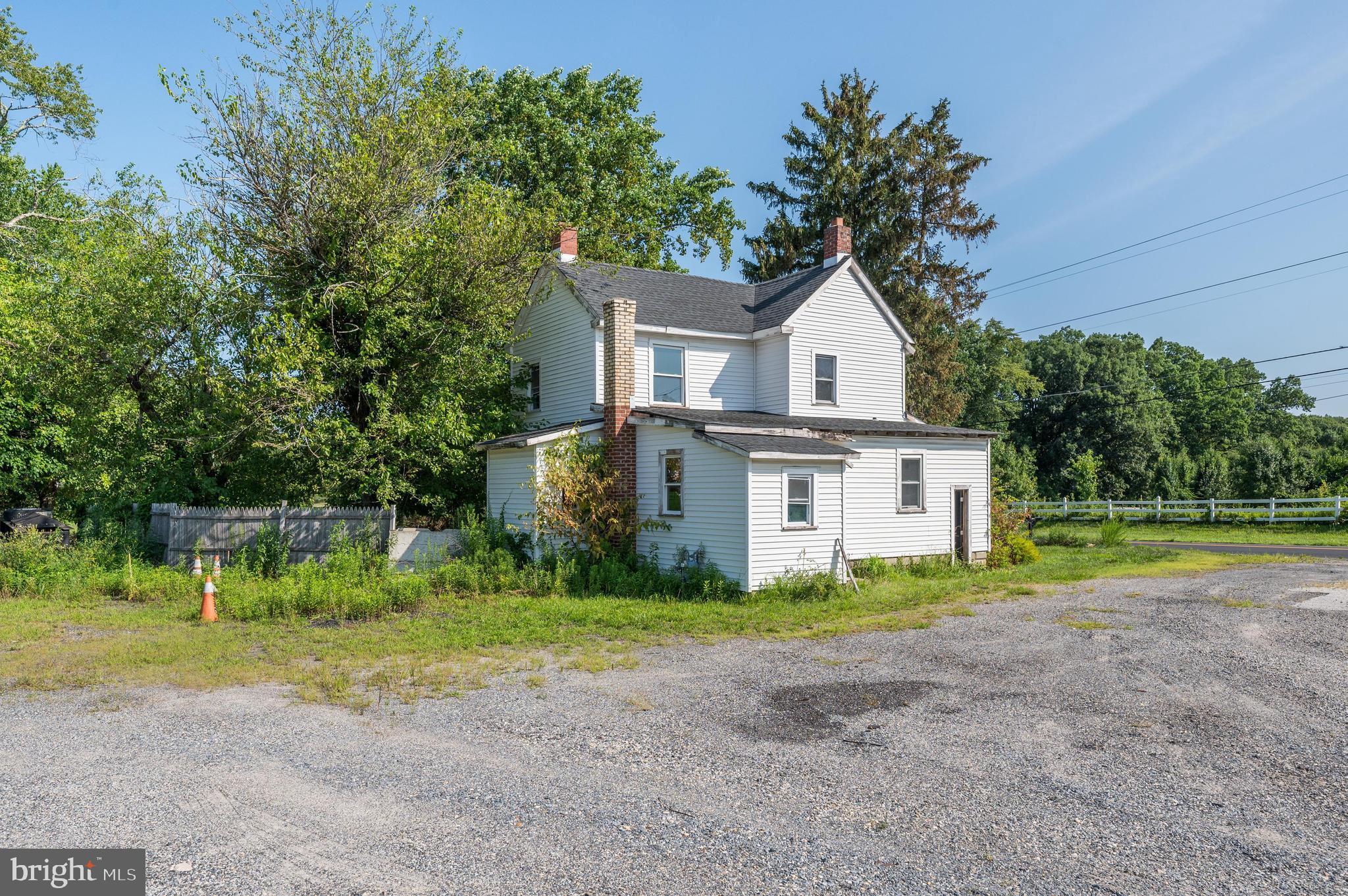 773 Watsontown Road Berlin, NJ 08009 - Photo 3 of 20 a house that has a tree in front of it