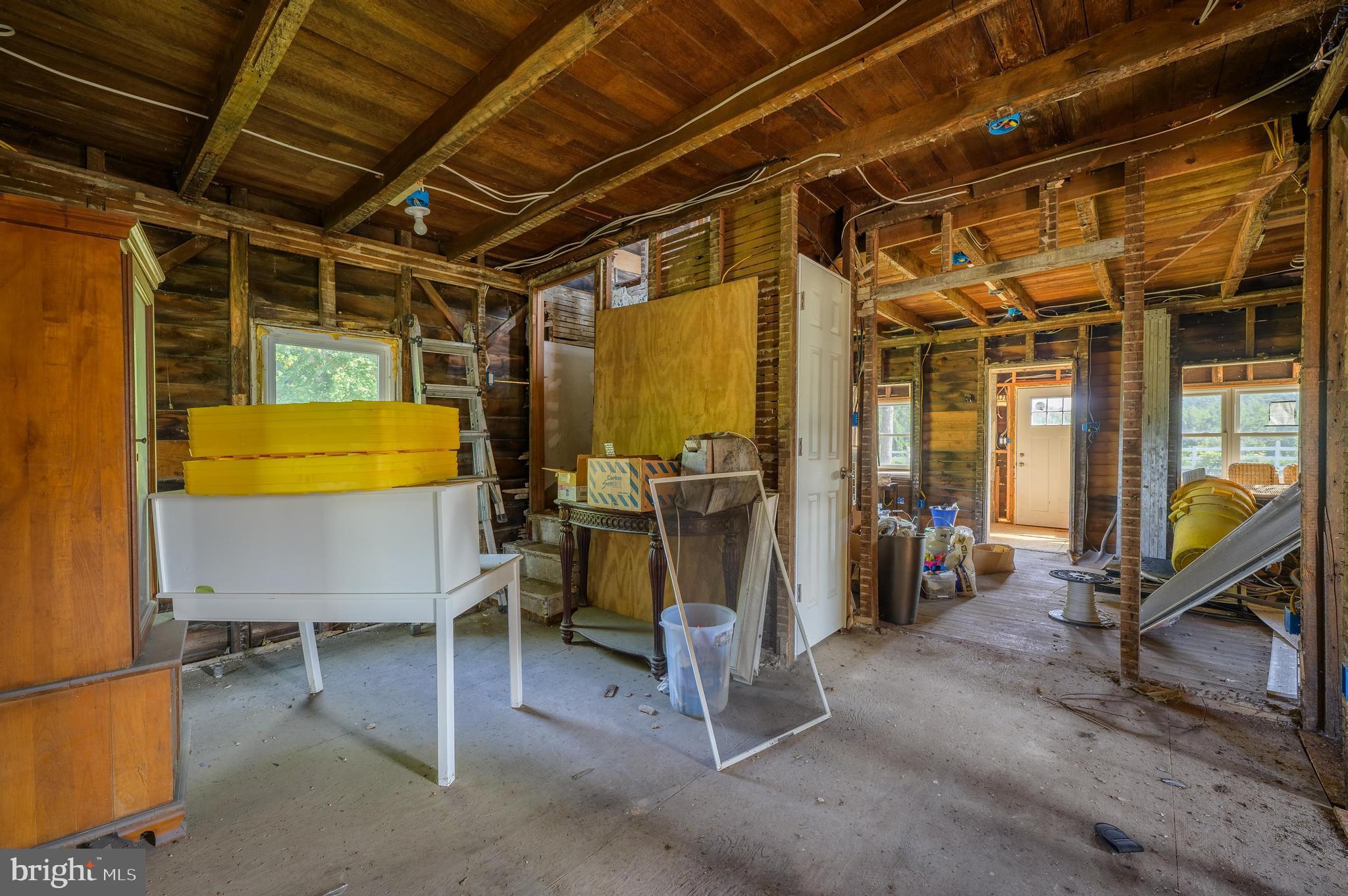 773 Watsontown Road Berlin, NJ 08009 - Photo 5 of 20 a view of a room with wooden chairs and furniture