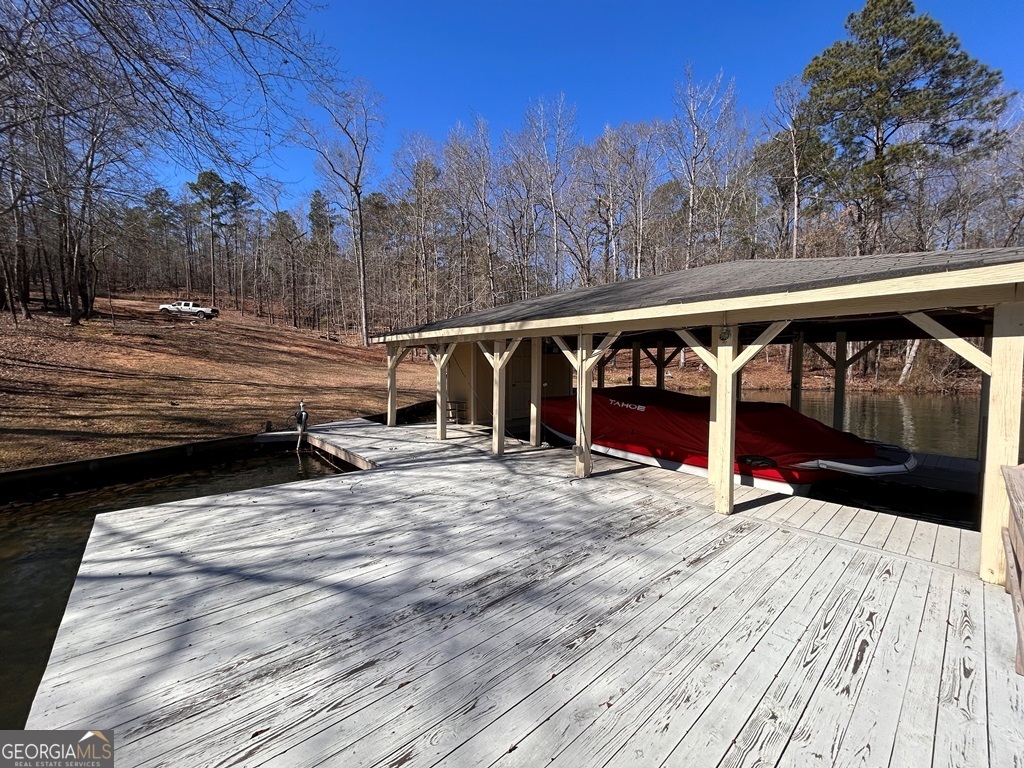 729-731 Marigold Road Sparta, GA 31087 - Photo 11 of 17 a view of balcony with wooden floor and outdoor space