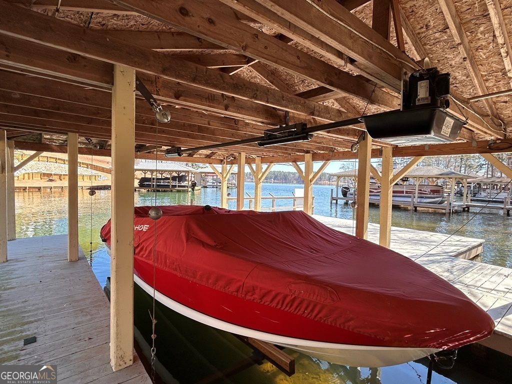 729-731 Marigold Road Sparta, GA 31087 - Photo 12 of 17 a blue swimming pool with a table and chairs