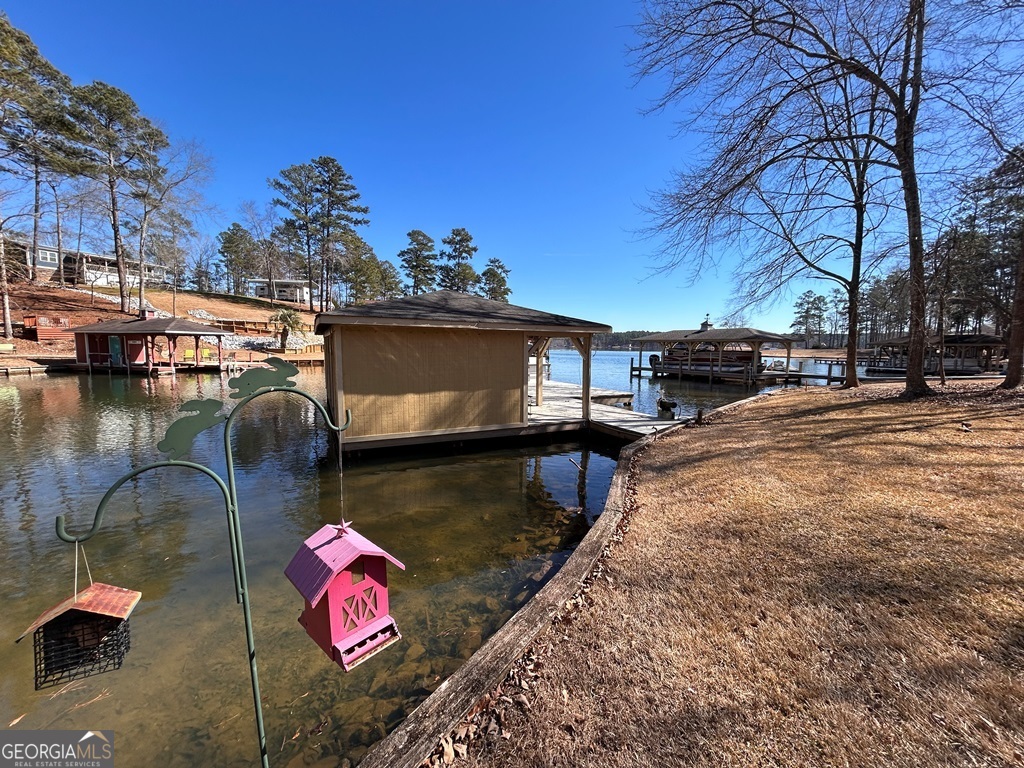 729-731 Marigold Road Sparta, GA 31087 - Photo 8 of 17 a view of swimming pool with outdoor seating and city view