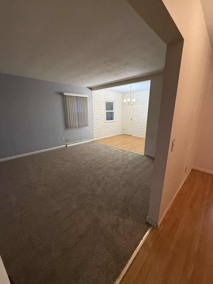 545 29th Avenue East Moline, IL 61244 - Photo 3 of 19 an empty room with windows