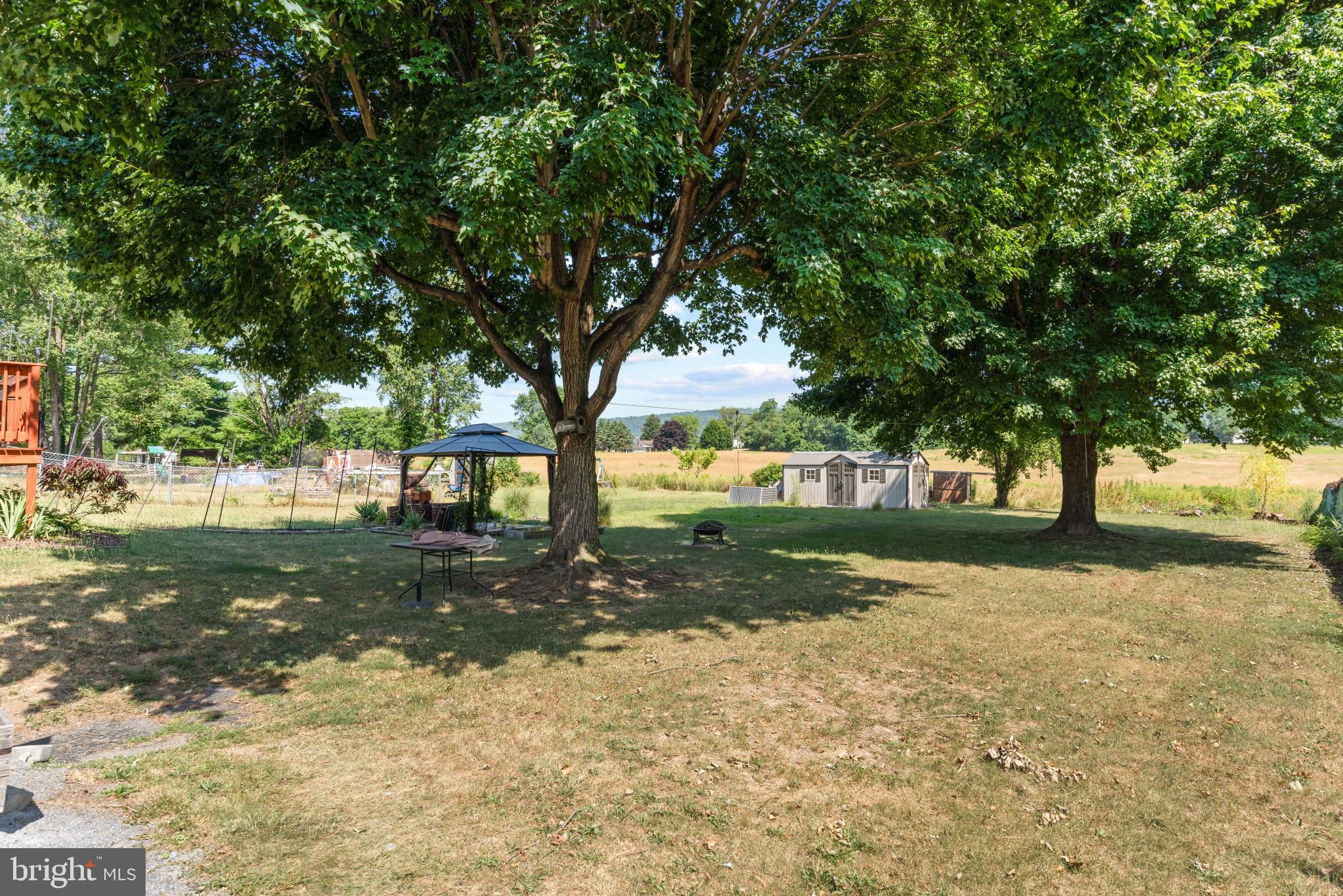 14 Sharon Road Enola, PA 17025 - Photo 32 of 40 Spacious backyard with mature shade trees, a cover