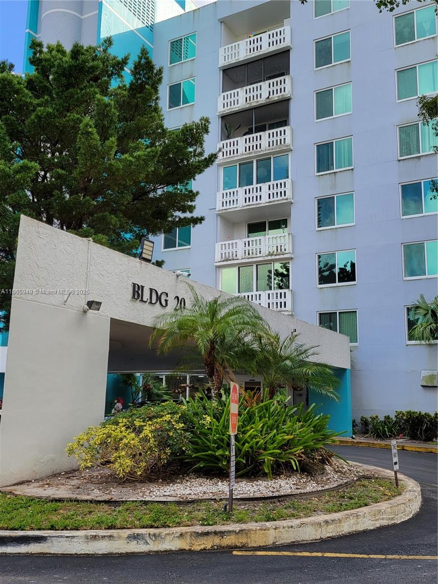 919 Hillcrest Drive, Unit 306 Hollywood, FL 33021 - Photo 1 of 30 a sign on the side of a building