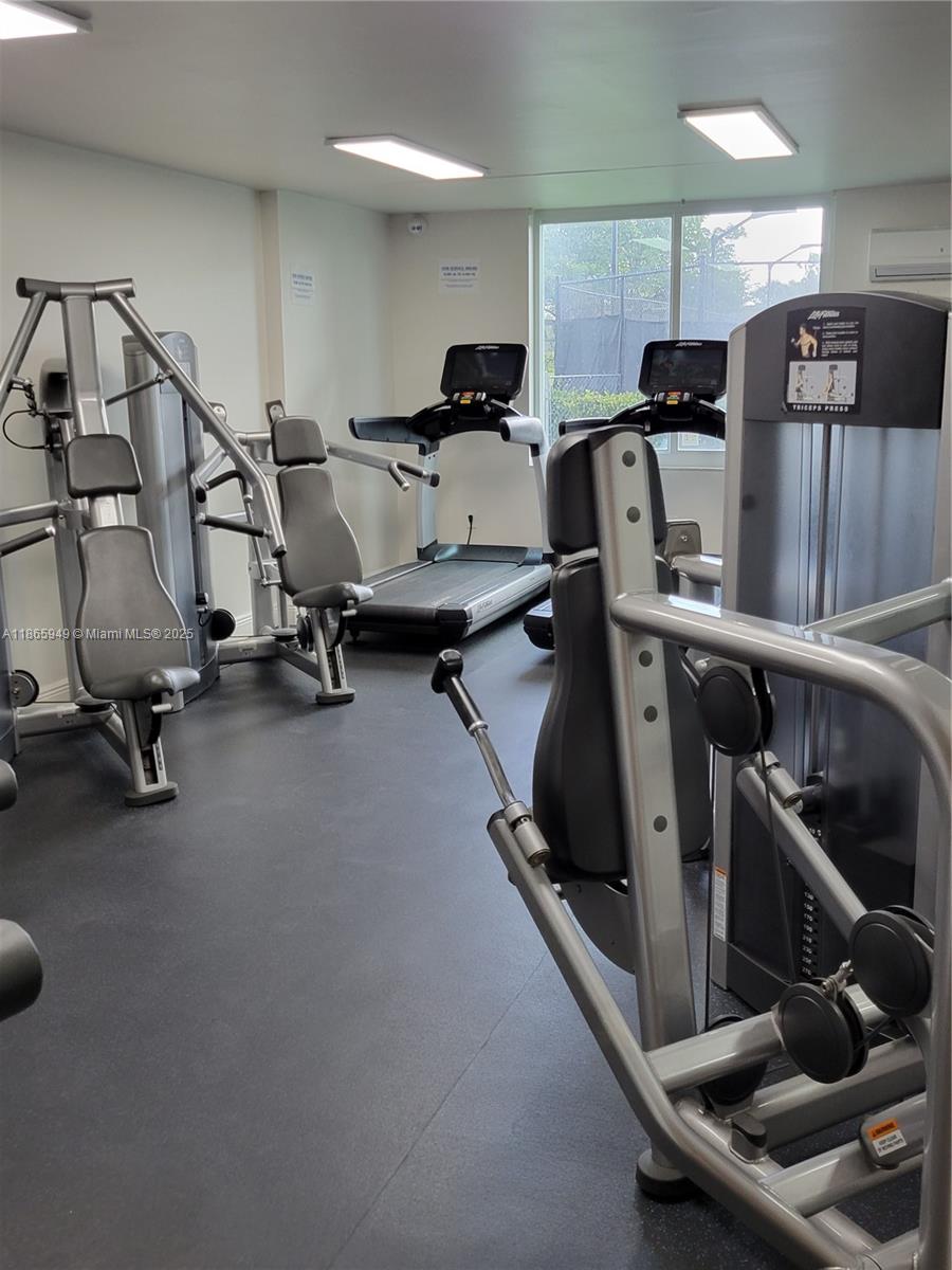 919 Hillcrest Drive, Unit 306 Hollywood, FL 33021 - Photo 24 of 30 a view of a room with gym equipment