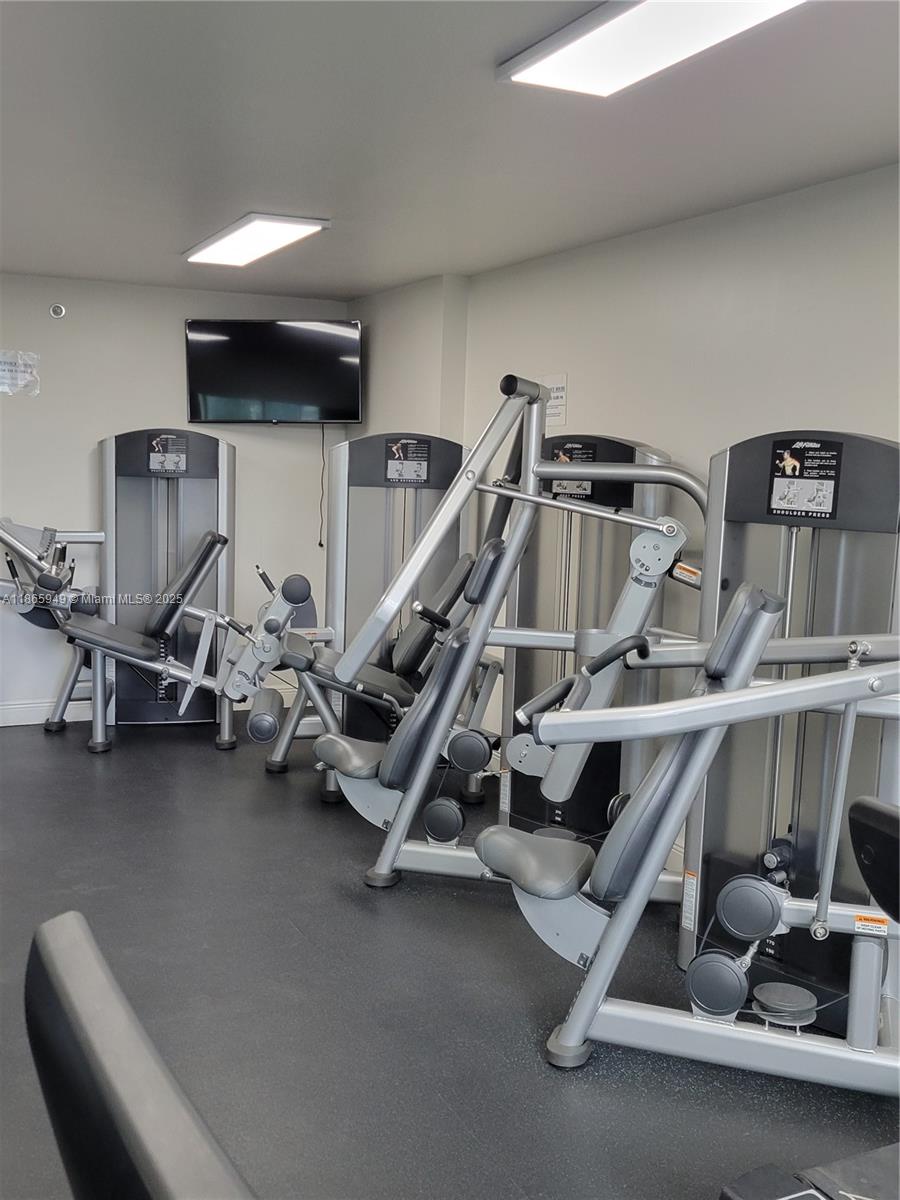 919 Hillcrest Drive, Unit 306 Hollywood, FL 33021 - Photo 25 of 30 a view of a room with gym equipment