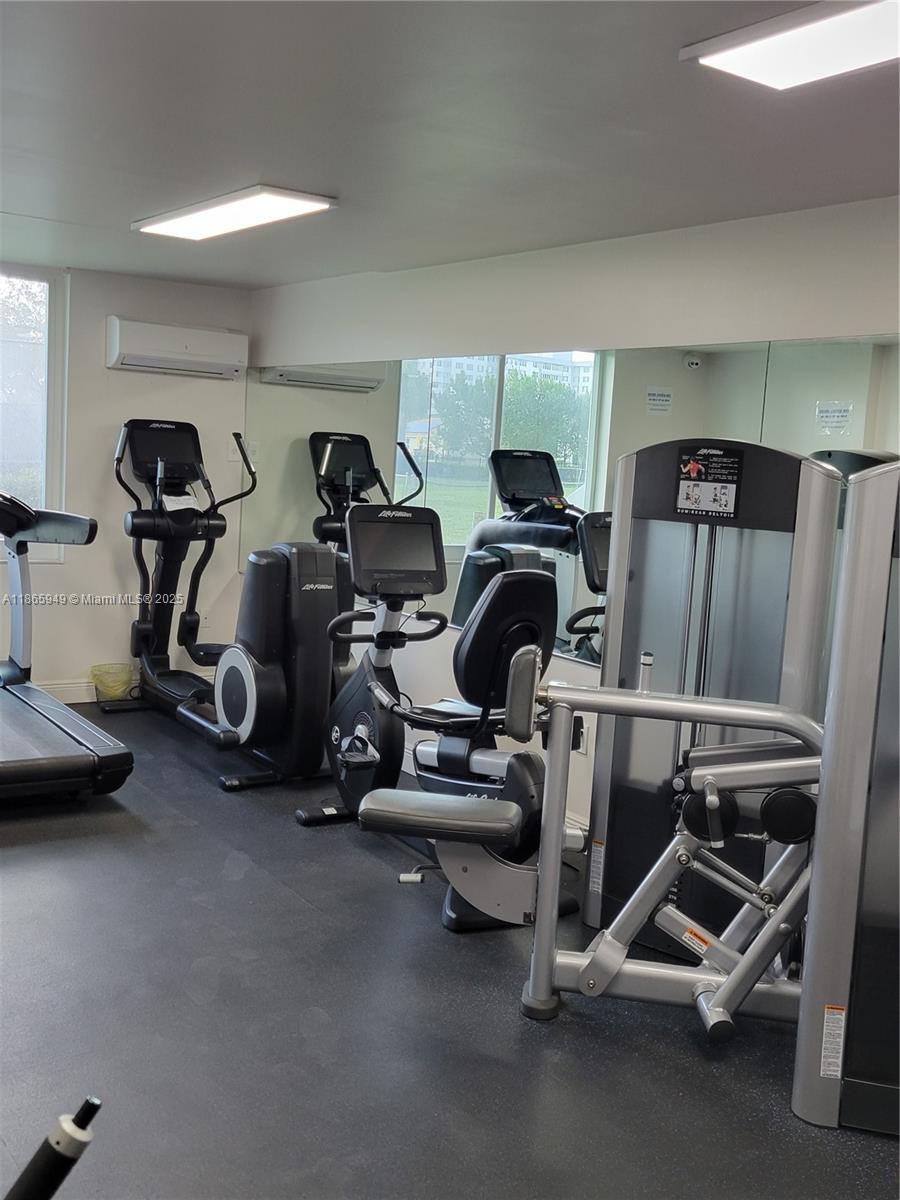 919 Hillcrest Drive, Unit 306 Hollywood, FL 33021 - Photo 26 of 30 a view of a room with gym equipment