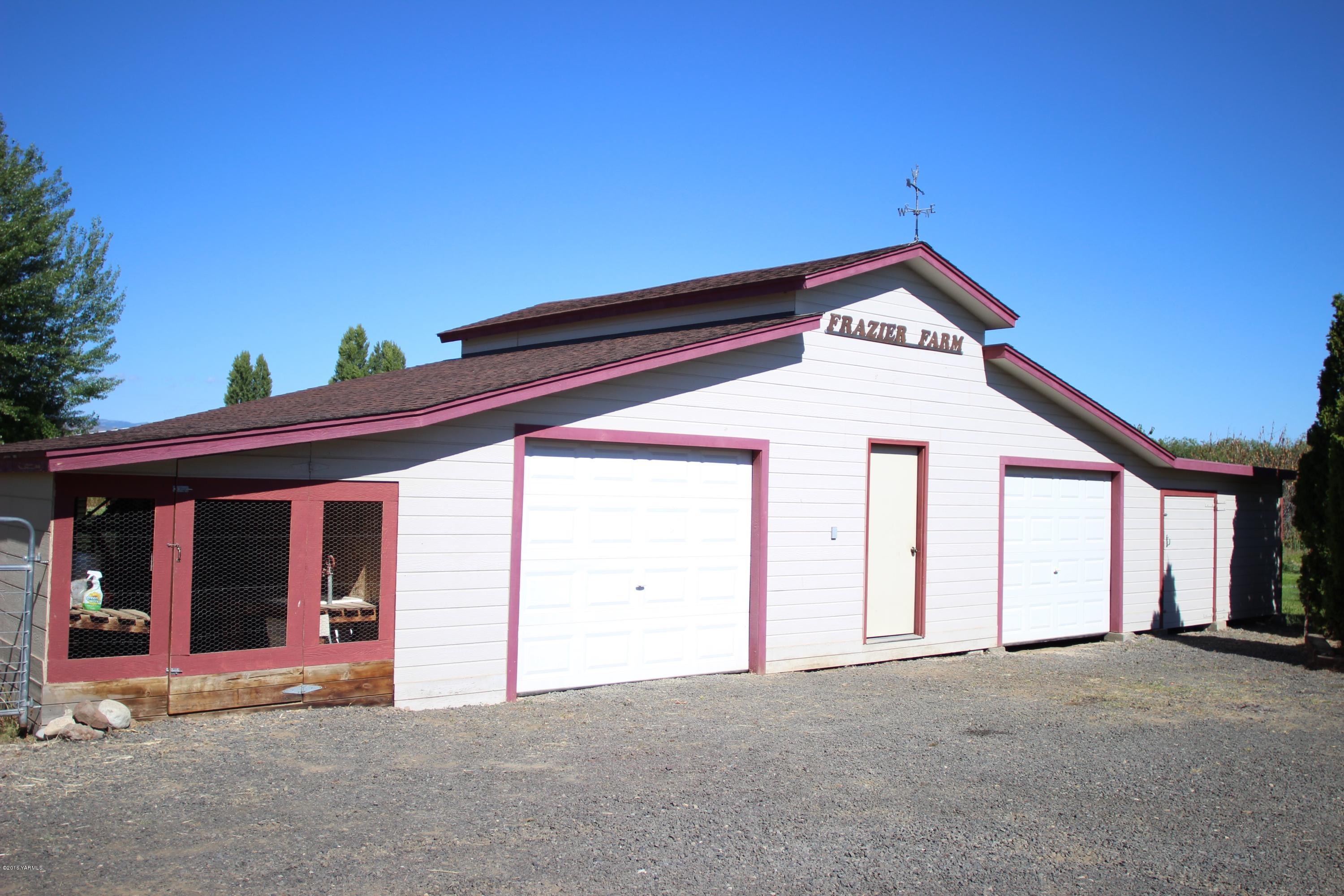 12831 Nelson Road Yakima, WA 98903 - Photo 3 of 24 a front view of a house