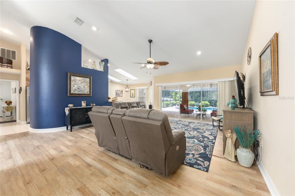 18825 Southwest 93rd Loop Dunnellon, FL 34432 - Photo 14 of 85 a living room with furniture and a chandelier