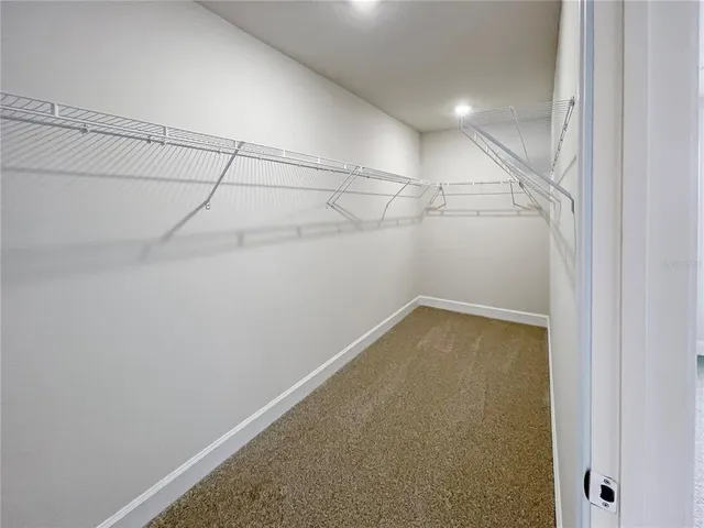 a view of a room with racks on the wall