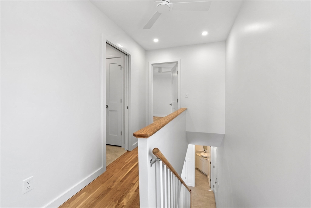 34 Constitution Way, Unit D Marblehead, MA 01945 - Photo 19 of 33 a view of a hallway with stairs