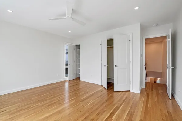 a view of livingroom with hardwood floor and hallway