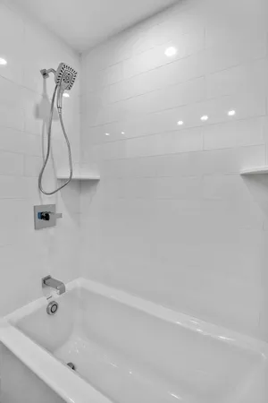 a bathroom with a bathtub