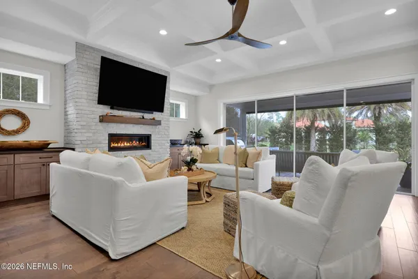 a living room with furniture and a window