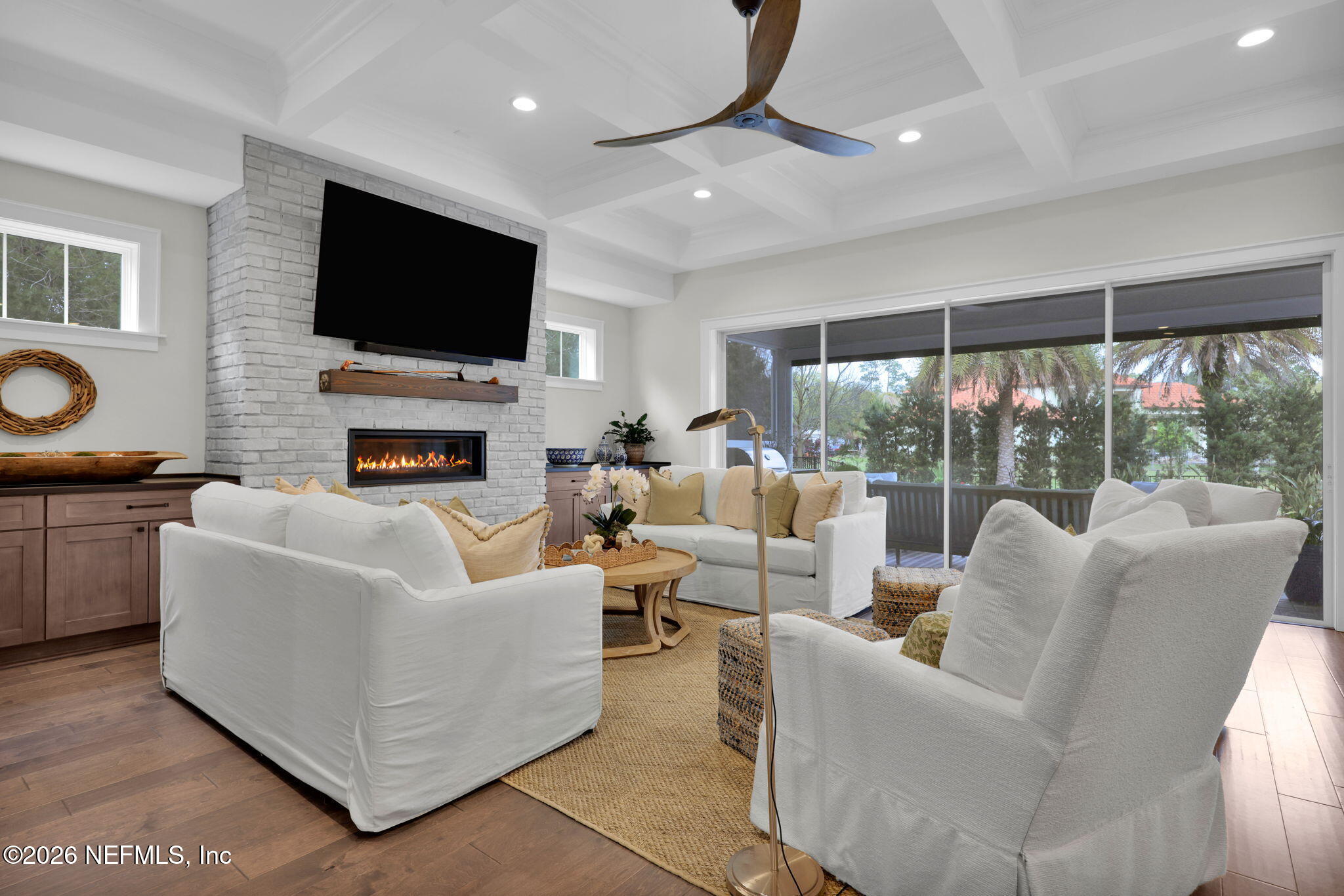 14303 Cottage Lake Road Jacksonville, FL 32224 - Photo 14 of 72 a living room with fireplace furniture and a flat screen tv