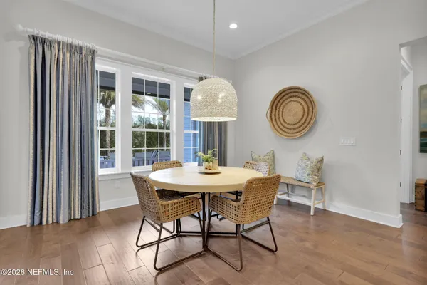 a kitchen with a sink cabinets and a window