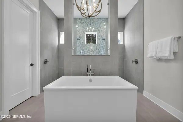 a view of cabinets with wooden floor