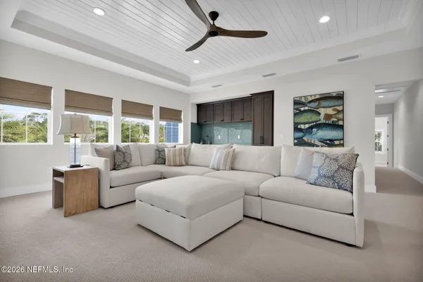 a outdoor living space with furniture and a potted plant