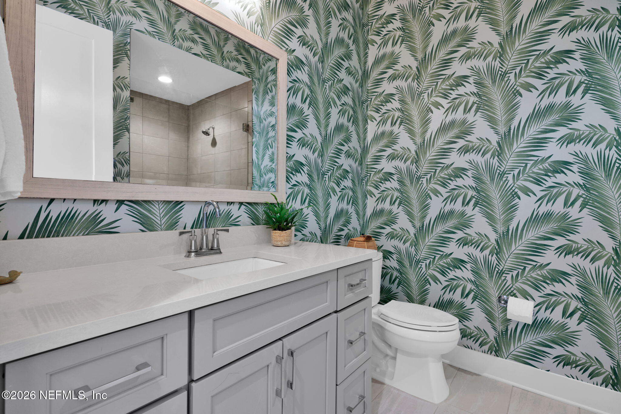 14303 Cottage Lake Road Jacksonville, FL 32224 - Photo 42 of 72 a bathroom with a granite countertop sink and a toilet