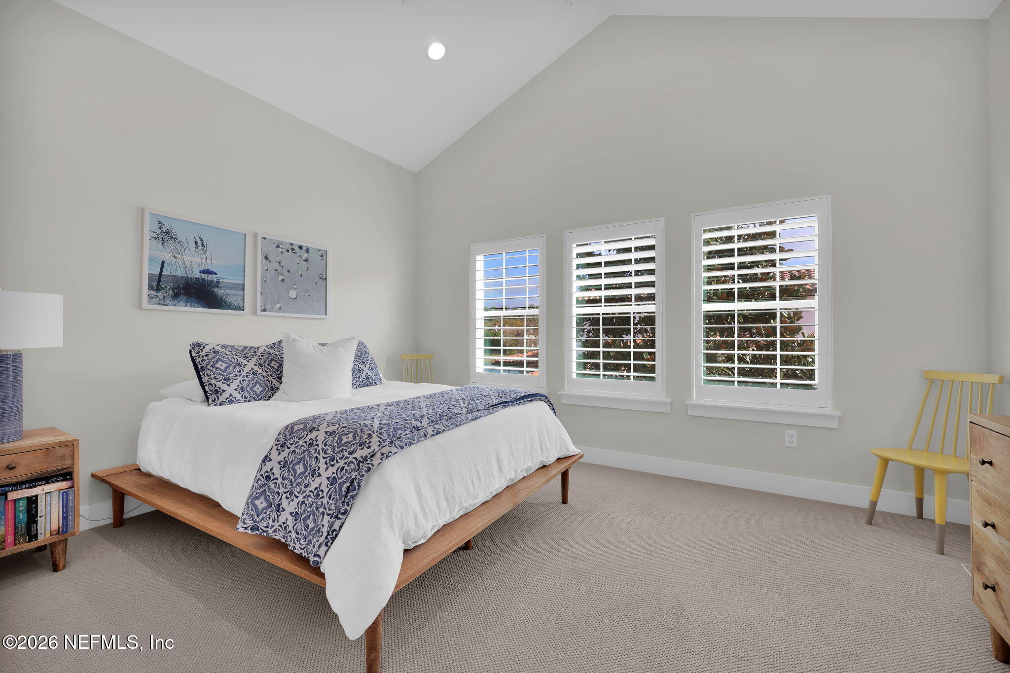 14303 Cottage Lake Road Jacksonville, FL 32224 - Photo 48 of 72 a bedroom with a bed chair and a large window