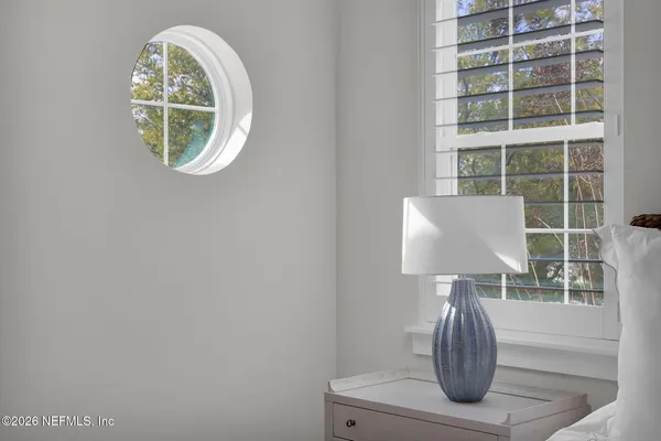 a view of a patio with a table chairs and a patio