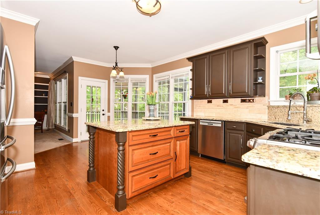 8305 Case Ridge Drive Oak Ridge, NC 27310 - Photo 19 of 48 Kitchen overlooking breakfast area.