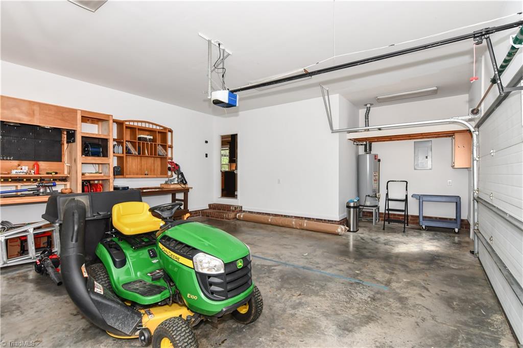 8305 Case Ridge Drive Oak Ridge, NC 27310 - Photo 25 of 48 Garage with work area.