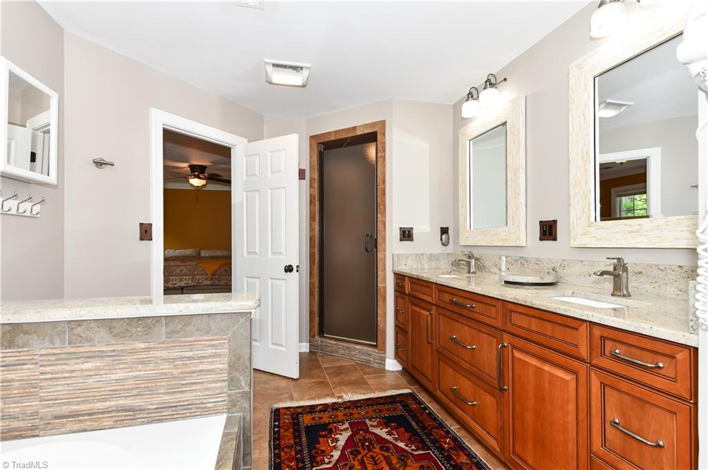 8305 Case Ridge Drive Oak Ridge, NC 27310 - Photo 39 of 48 Overview of primary bath.