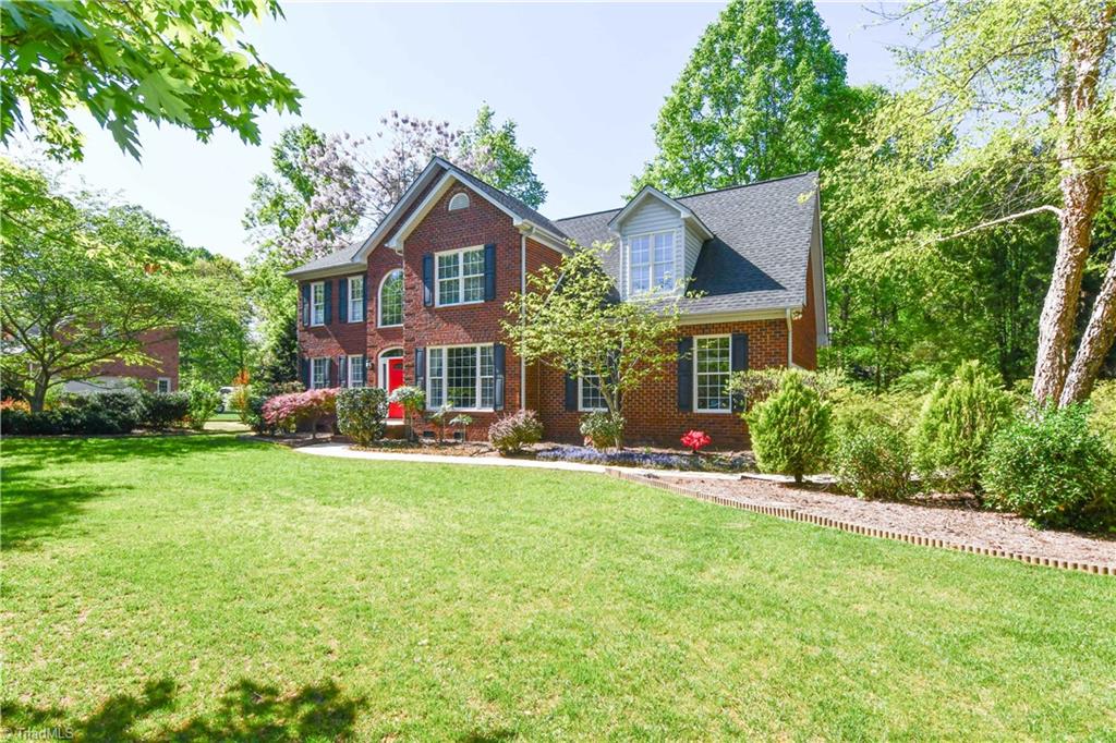 8305 Case Ridge Drive Oak Ridge, NC 27310 - Photo 7 of 48 Spring and Summer are stunning here with all the shrubbery and trees coming out in their splendor.