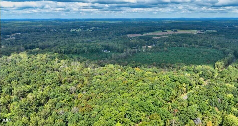 8635 Johnson Mill Road Bahama, NC 27503 - Photo 3 of 5 a view of a field with an ocean