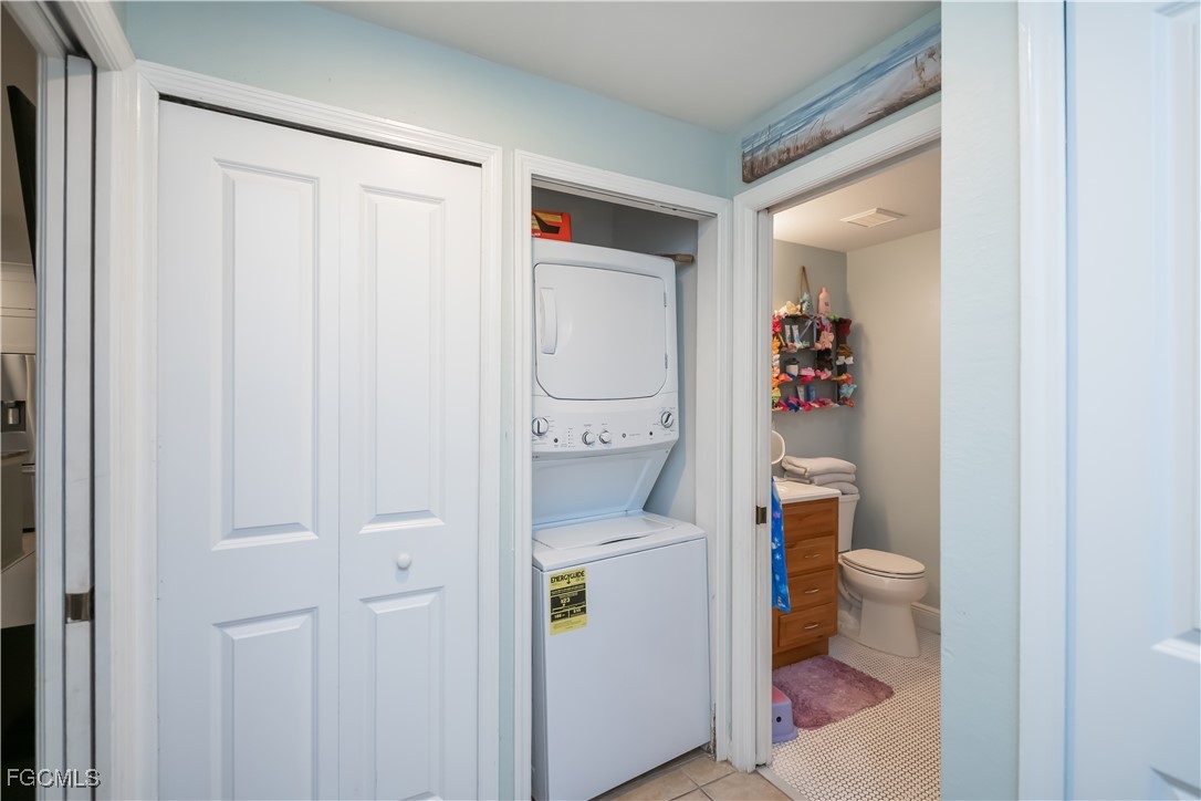 8513 Bernwood Cove Loop, Unit 212 Fort Myers, FL 33966 - Photo 22 of 43 a bathroom with a toilet and a shower