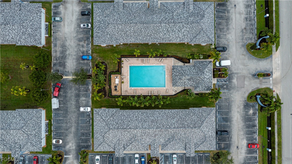 8513 Bernwood Cove Loop, Unit 212 Fort Myers, FL 33966 - Photo 40 of 43 an aerial view of a house with a yard and potted plants