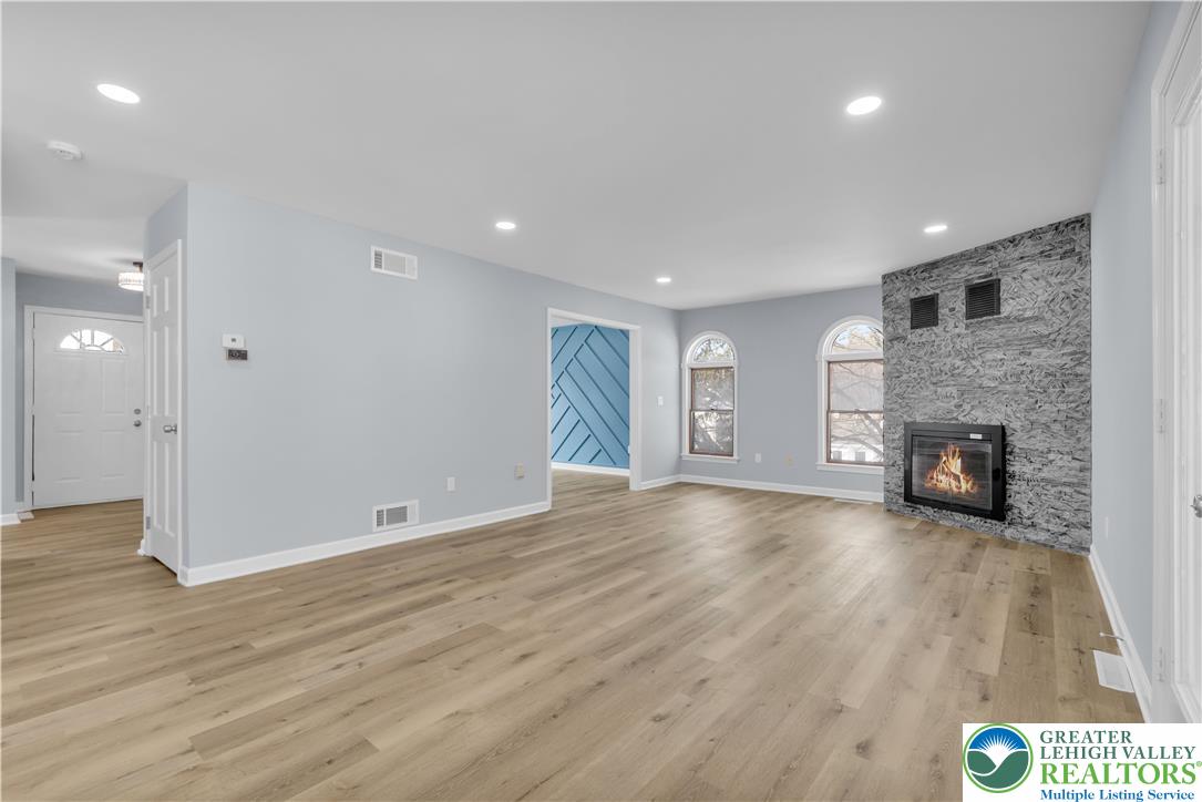 15 Spring Water Court Easton, PA 18042 - Photo 17 of 51 Family Room, flames AI enhanced images