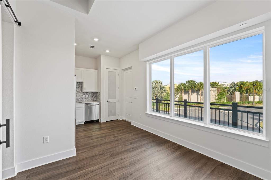 850 TETBURY Loop Oviedo, FL 32765 - Photo 6 of 24 a view of a kitchen with a large window