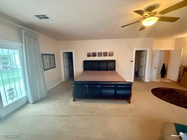 10561 Rancho Destino Road Las Vegas, NV 89183 - Photo 15 of 29 Bedroom featuring light colored carpet, ceiling fan, and visible vents