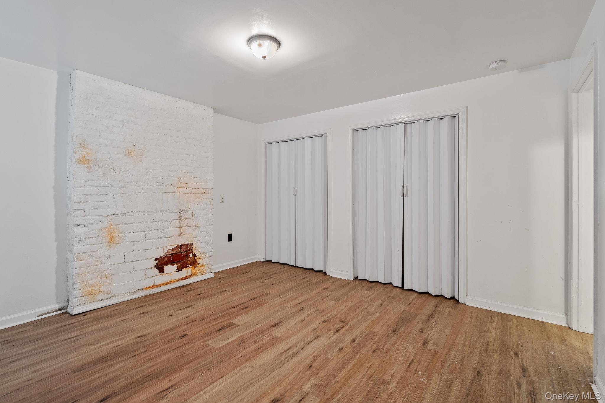 160 Lander Street Newburgh, NY 12550 - Photo 11 of 29 a view of a room with wooden floor
