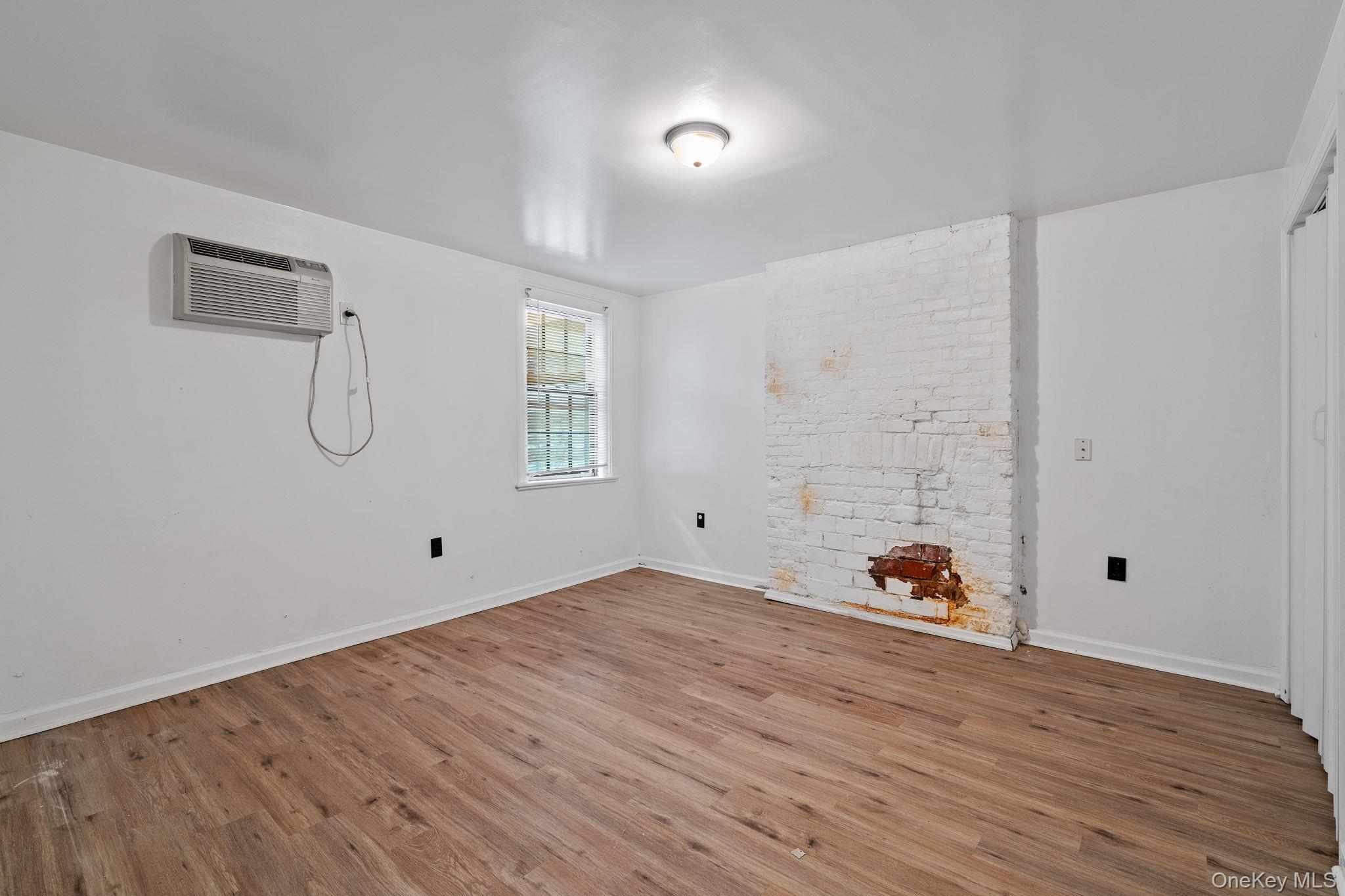 160 Lander Street Newburgh, NY 12550 - Photo 12 of 29 a view of a room with wooden floor and entryway