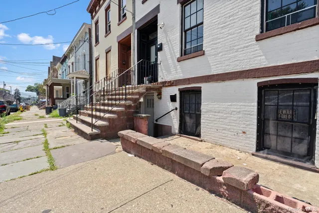 a view of a street with buildings