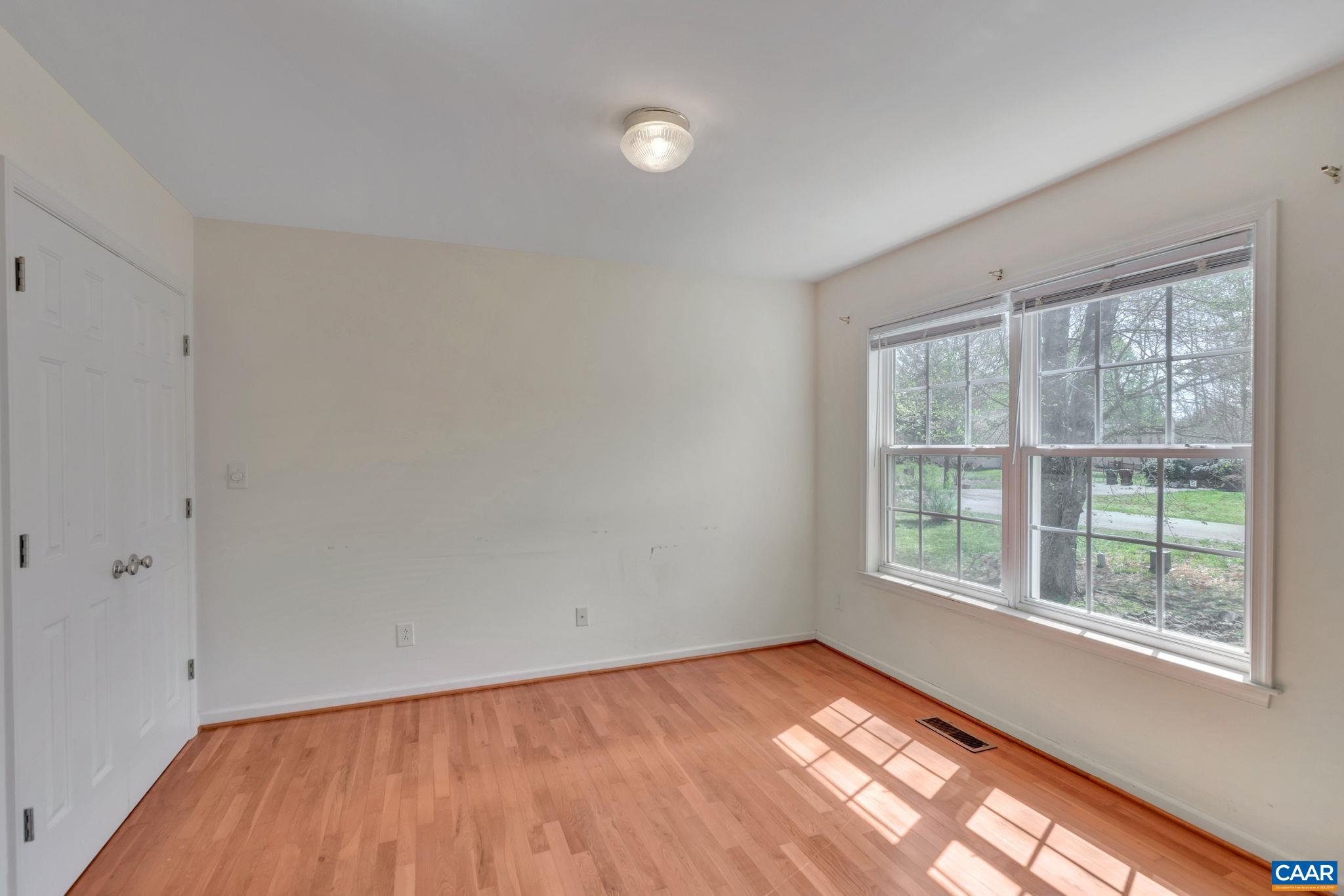 18 Loblolly Road Palmyra, VA 22963 - Photo 13 of 41 a view of an empty room with a window and wooden floor
