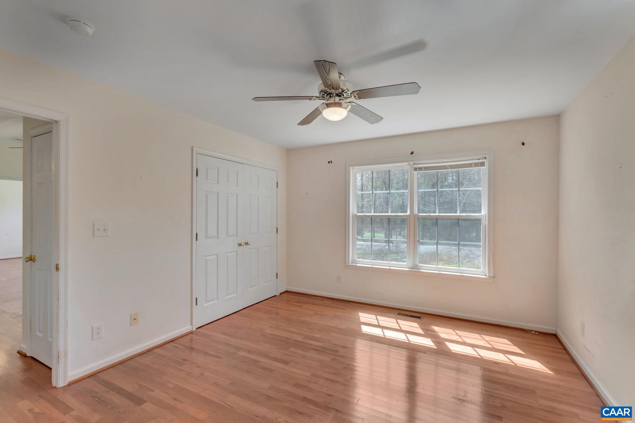 18 Loblolly Road Palmyra, VA 22963 - Photo 16 of 41 a view of empty room with wooden floor and fan