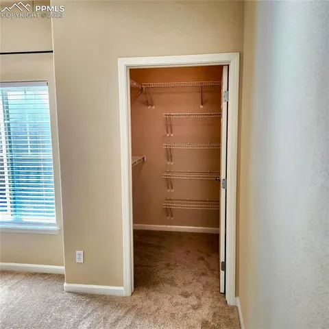 a view of swimming pool from a balcony