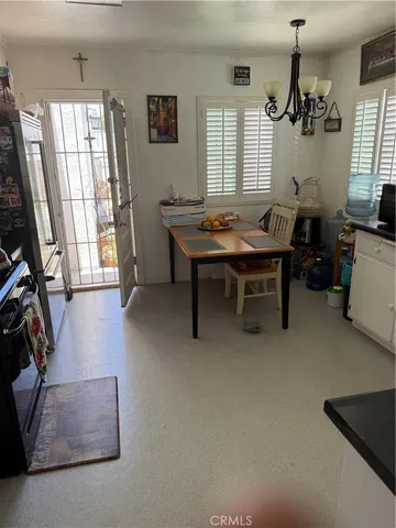 a view of a livingroom with furniture and window