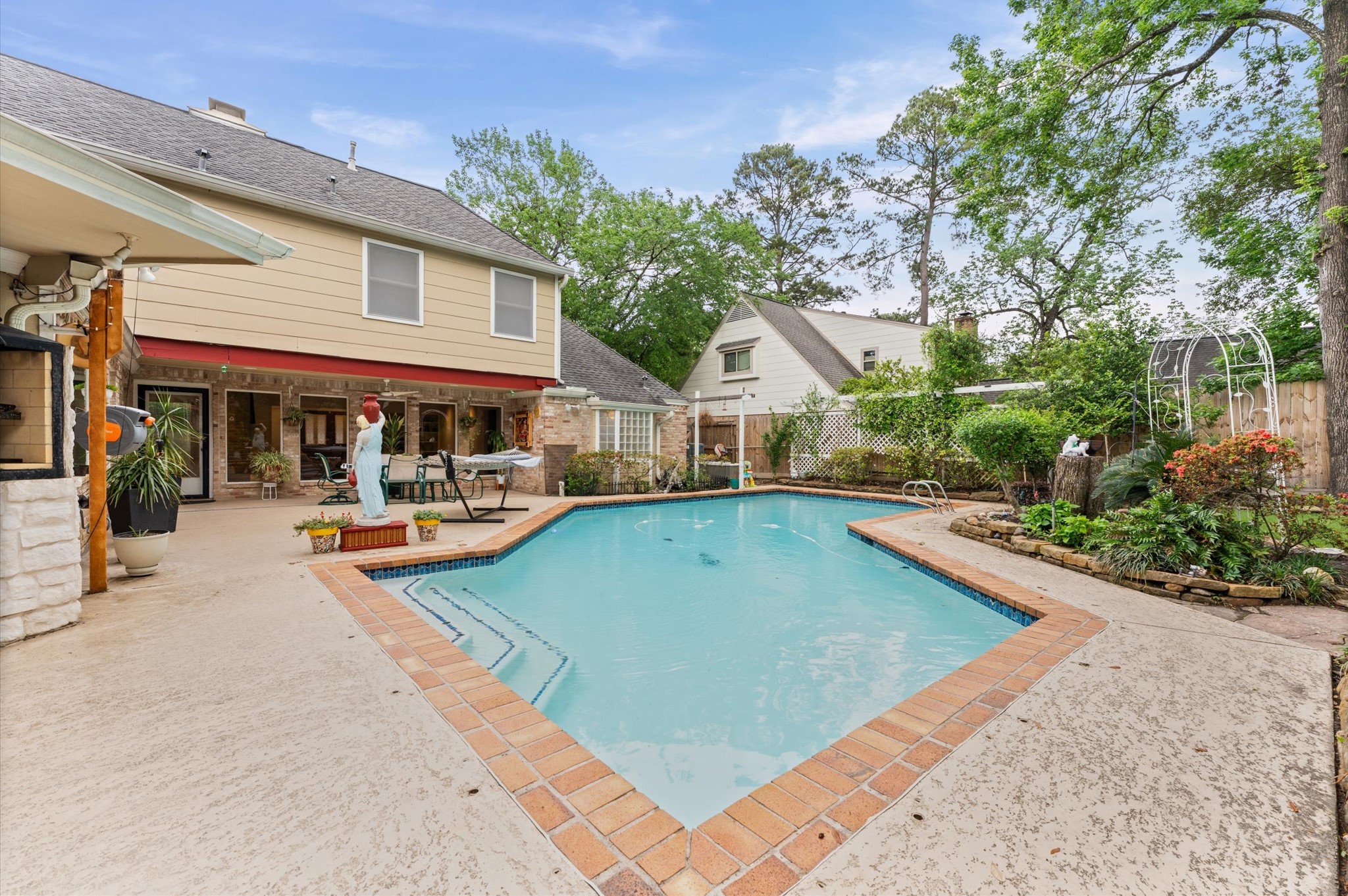 17403 Butte Creek Road Houston, TX 77090 - Photo 25 of 39 heated saltwater swimming pool