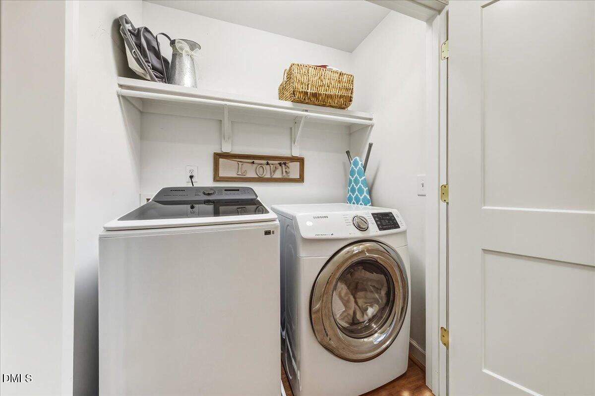 617 Rodney Bay Crossing Wake Forest, NC 27587 - Photo 17 of 36 a utility room with dryer and washer