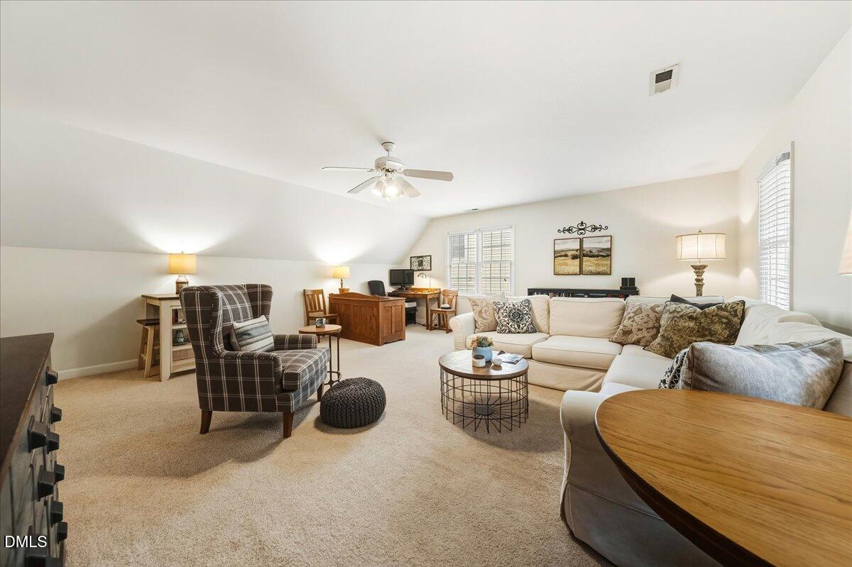 617 Rodney Bay Crossing Wake Forest, NC 27587 - Photo 27 of 36 a living room with furniture