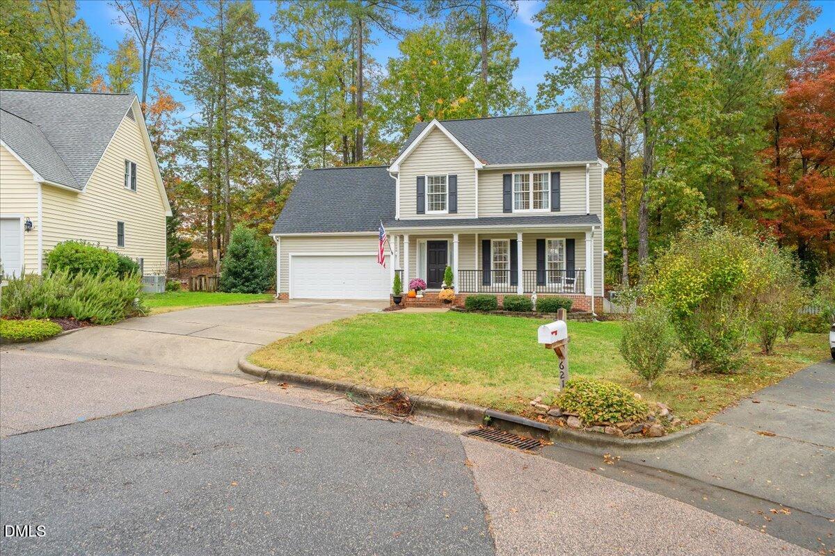 617 Rodney Bay Crossing Wake Forest, NC 27587 - Photo 3 of 36 front view of a house next to a yard