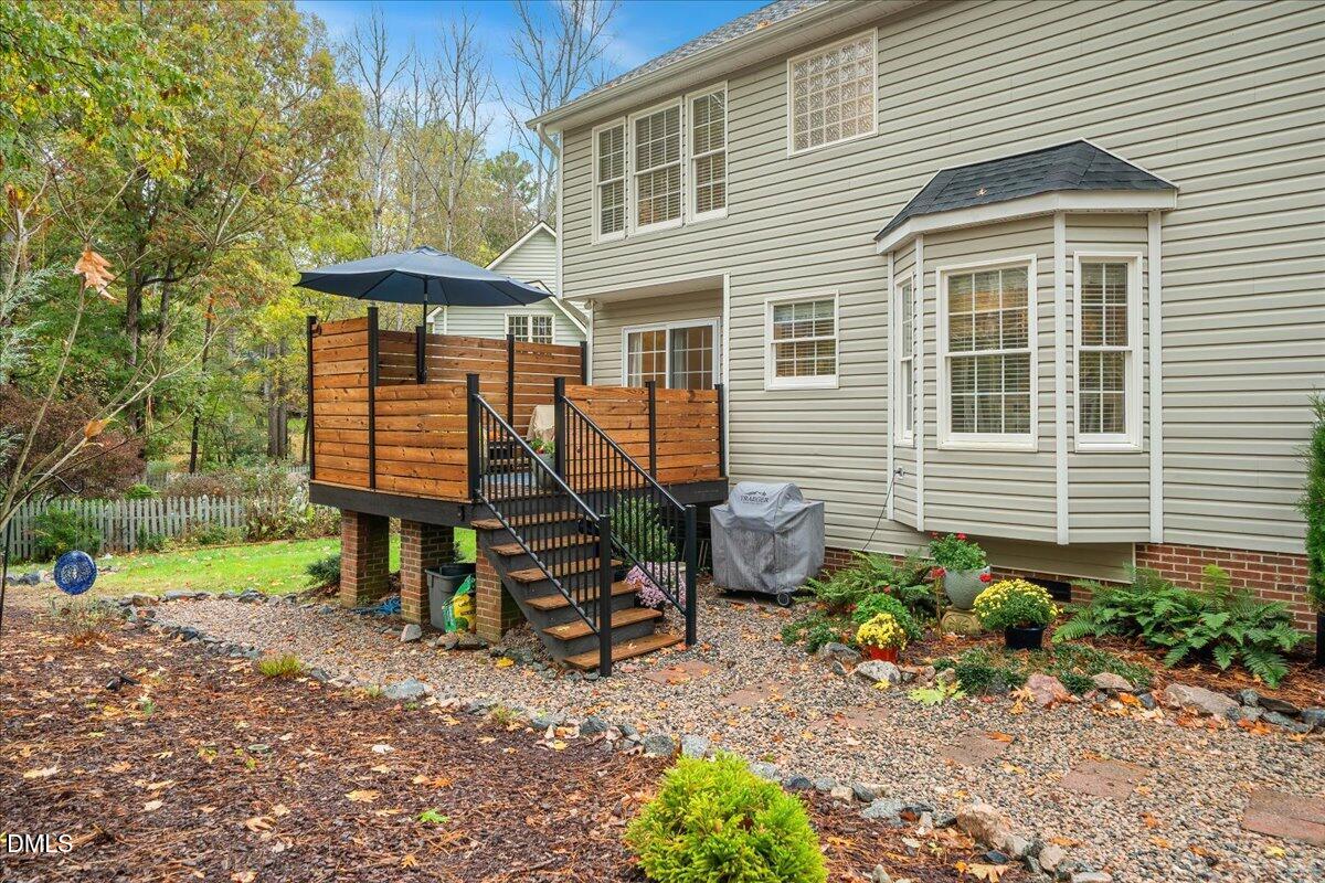 617 Rodney Bay Crossing Wake Forest, NC 27587 - Photo 31 of 36 a view of a house with a yard and sitting area