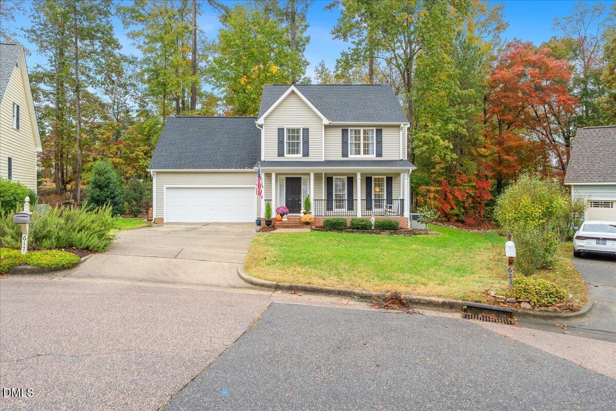 617 Rodney Bay Crossing Wake Forest, NC 27587 - Photo 36 of 36 a front view of a house with a yard and trees